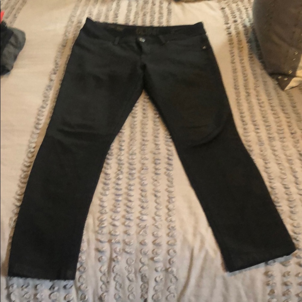Black stretchy ankle length jeans , mid rise